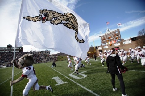 The Leopard leads the team onto the field.
