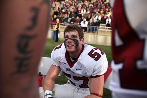 Linebacker Ben Aloi ’14 takes a break as the game winds down. 