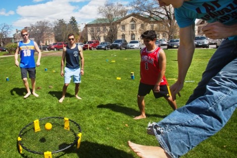 Students play spike ball. 