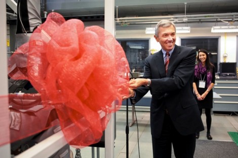 Stephen Pryor '71, vice president of the Board of Trustees, officially cuts the ribbon.