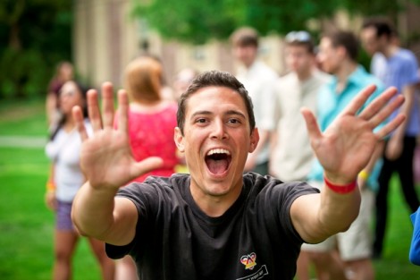 A student gets excited for the senior class photo. 