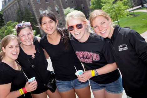 Seniors enjoy Italian ice and music by the Hoochie Coochie Men student band on the Quad.