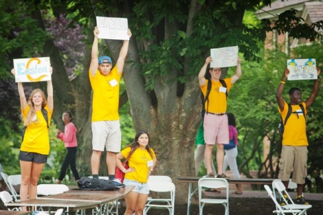 Orientation leaders round up new students based on residence hall.