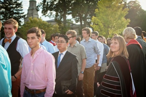 President Alison Byerly greets students on their way to the ceremony.