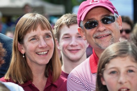 President Alison Byerly, her son, Ryan, and her husband, Stephen Jensen, enjoy the pepper-eating contest.