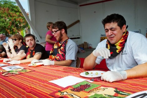 Some contestants struggle to get the peppers down.
