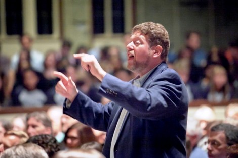 Darin Lewis, instructor of music, conducts the Concert Choir.