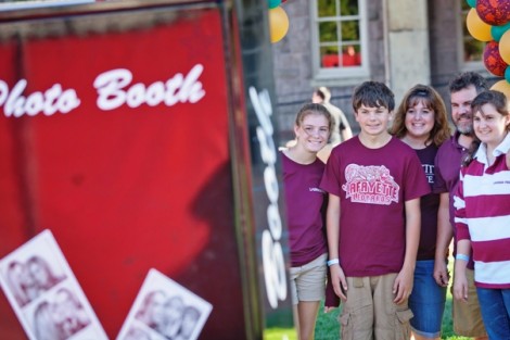 A family gets its picture taken at the photo booth.