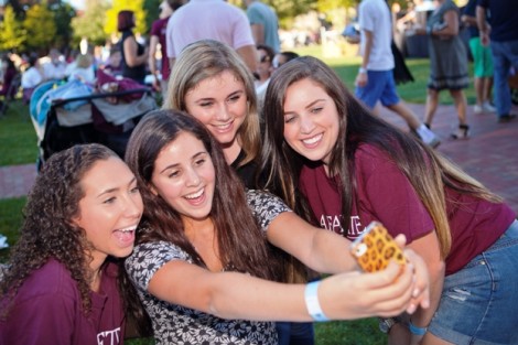 Students take a selfie.