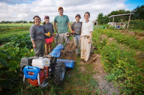 Sarah Edmonds, director of LaFarm, Kelly Carpency '16, Eric Giovannetti '15, Joseph Ingrao '16, and Jen Ruocco '14 after a hard day’s work on the farm