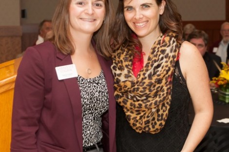 Melissa Schultz, associate director of career services, presents Danielle DeVita McWilliams ’04 with the Externship Commitment Award.