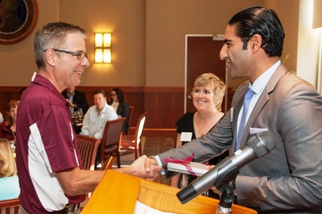 Scott Hummel, Jeffers Director of Engineering, accepts the Daniel L. Golden ’34 Faculty Service Award from Alex Karapetian ’04, president of the Alumni Association.