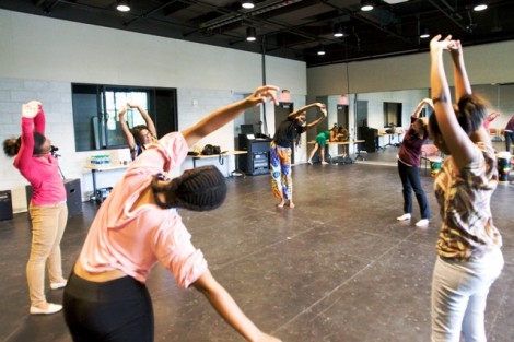 The group stretches prior to the workshop.