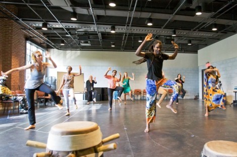 Senegalese percussionist Lamine Touré leads the workshop.