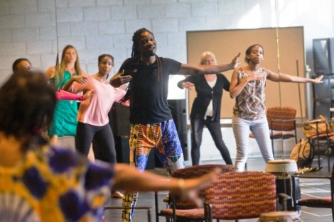 Senegalese percussionist Lamine Touré leads the workshop.