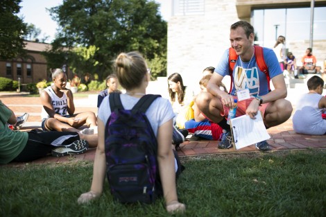 Brian Dierze ’16 shares a laugh with a camper.
