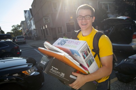 Jonathan Anastos ’19 carries his things to his new hall.