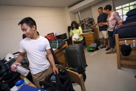 A new student sets up his room.