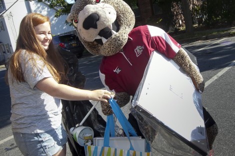 The Leopard gives Lauren Fox ’19 a helpful hand.