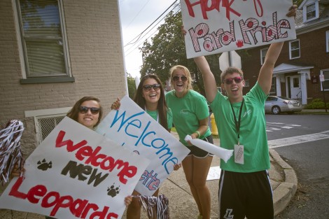 Upperclassmen welcome new students on McCartney Street.