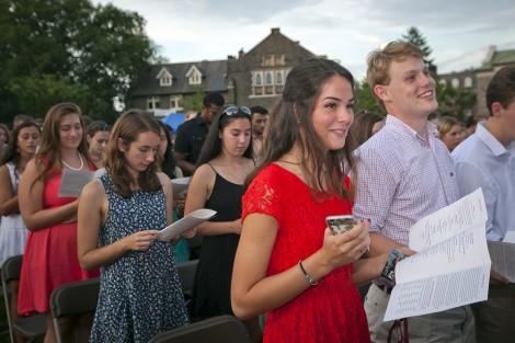 New students sing the alma mater for the first time.