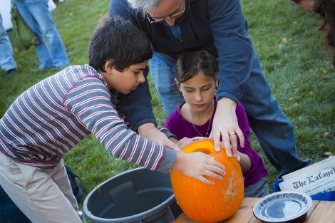 Professor Benjamin Cohen helps his kids Harper and Alexandra.