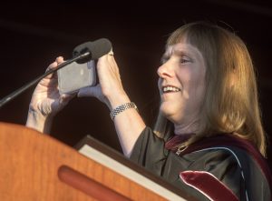 President Alison Byerly takes a photo of the new class to post on Twitter.
