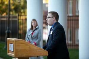 Michael DeLisi ’03 speaks at last year's house dedication ceremony. 