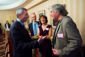 Don Chambers and his wife, Suzanne, talk with trustee Stephen Pryor '71 (far left) and Professor D.C. Jackson.
