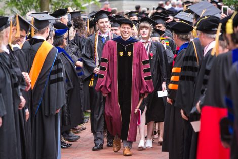 Dean of Students Paul McLoughlin leads the students.