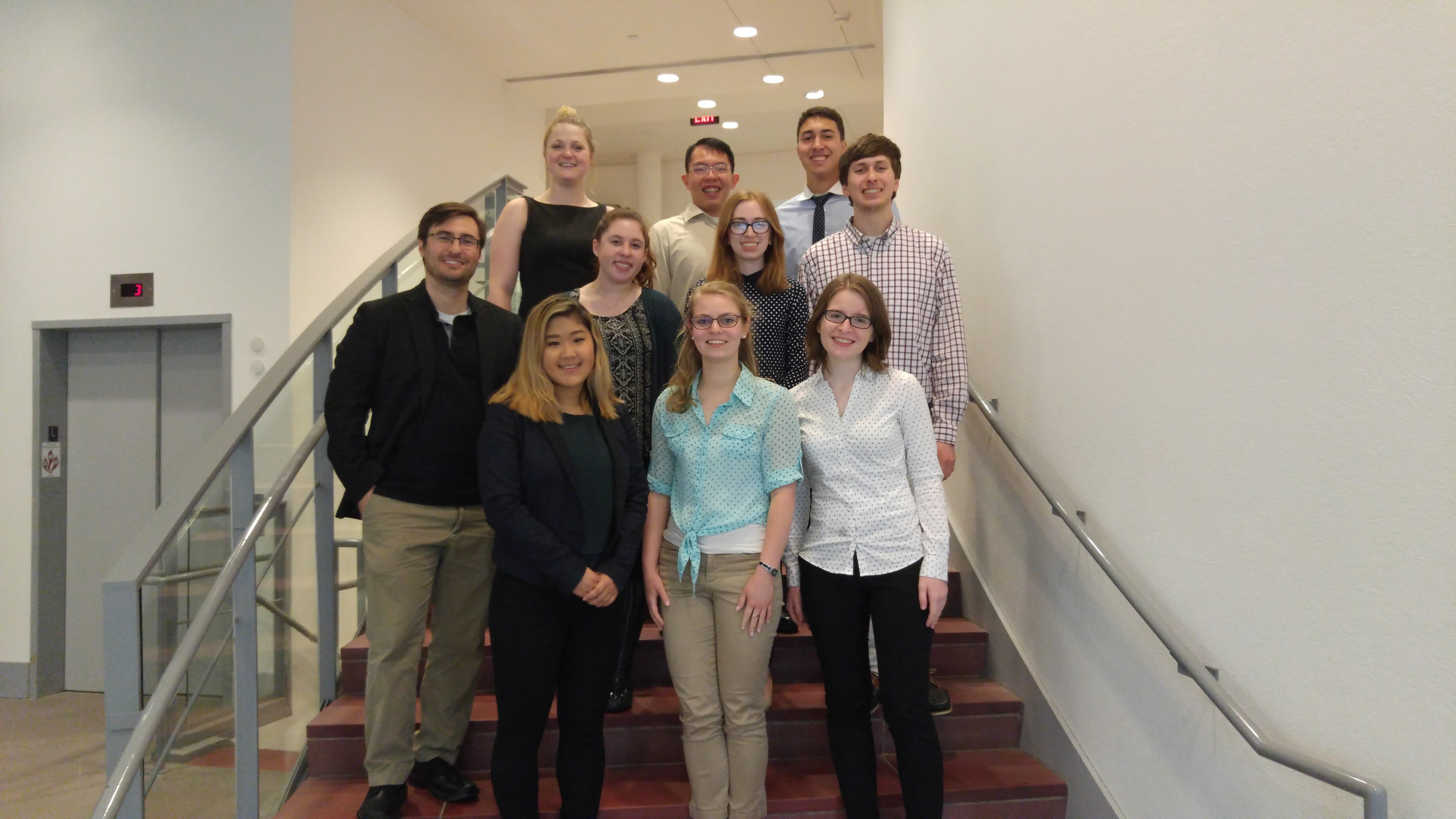 Professor Justin Hines (left) and his 2016-17 research students