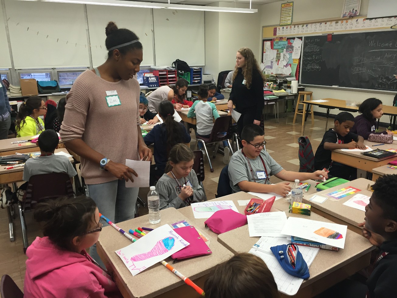 Lafayette students work with Cheston Elementary School children to help them learn about climate change.