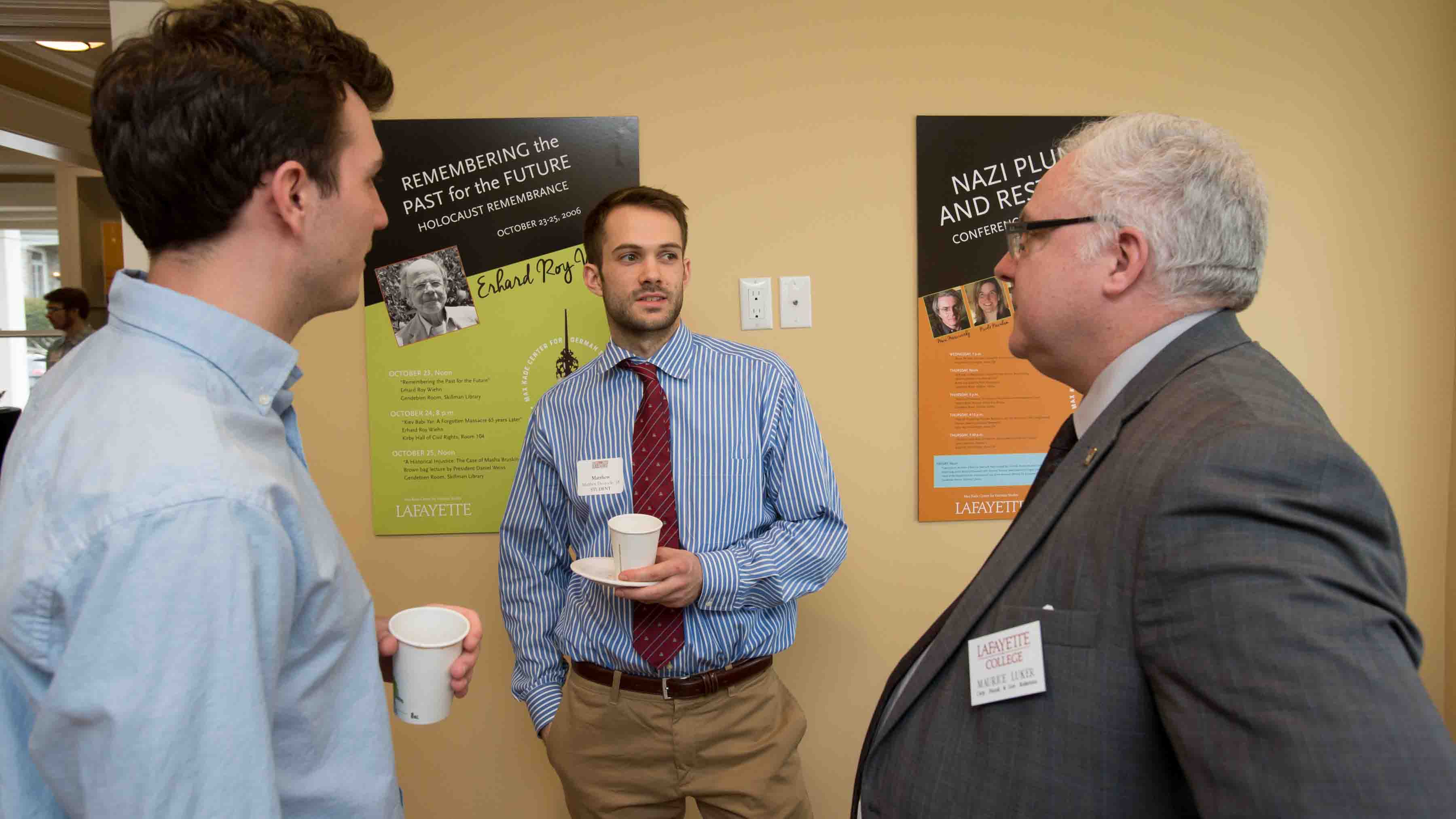 Guests talk during the Max Kade Haus dedication.