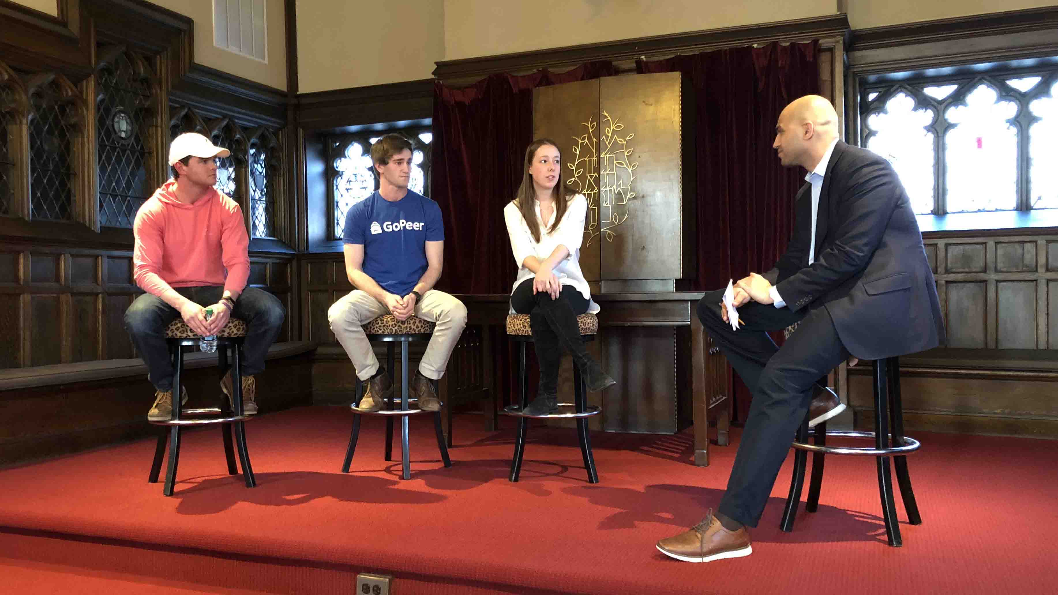 Three student entrepreneurs and Yusuf Dahl, director of the IDEAL Center for Innovation and Entrepreneurship, have a panel discussion.