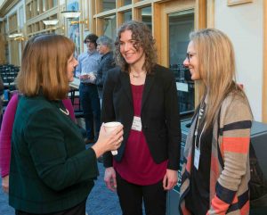 Lafayette President Alison Byerly speaks with Marie Fechik-Kirk, director of sustainability, and Kalyna Prockyk of Muhlenberg College