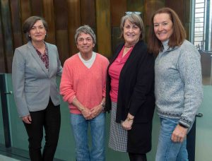 From left: Elaine Stomber '89, associate college archivist; Rita Mae Brown; Diane Shaw, College archivist; and Dr. Catherine Hanlon '79