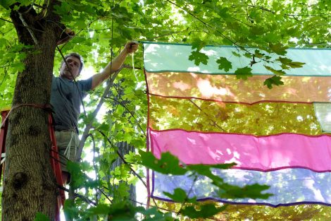 Jim Toia helps install the Site Lines art installation on the Karl Stirner Arts Trail.