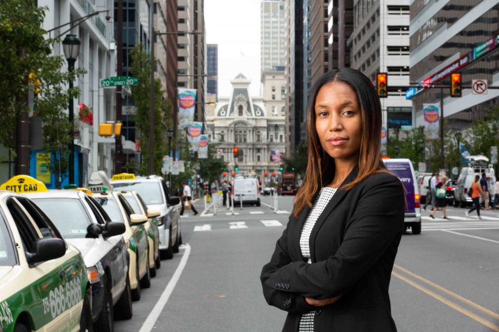 Lawyer Kristen Feden stands on the street