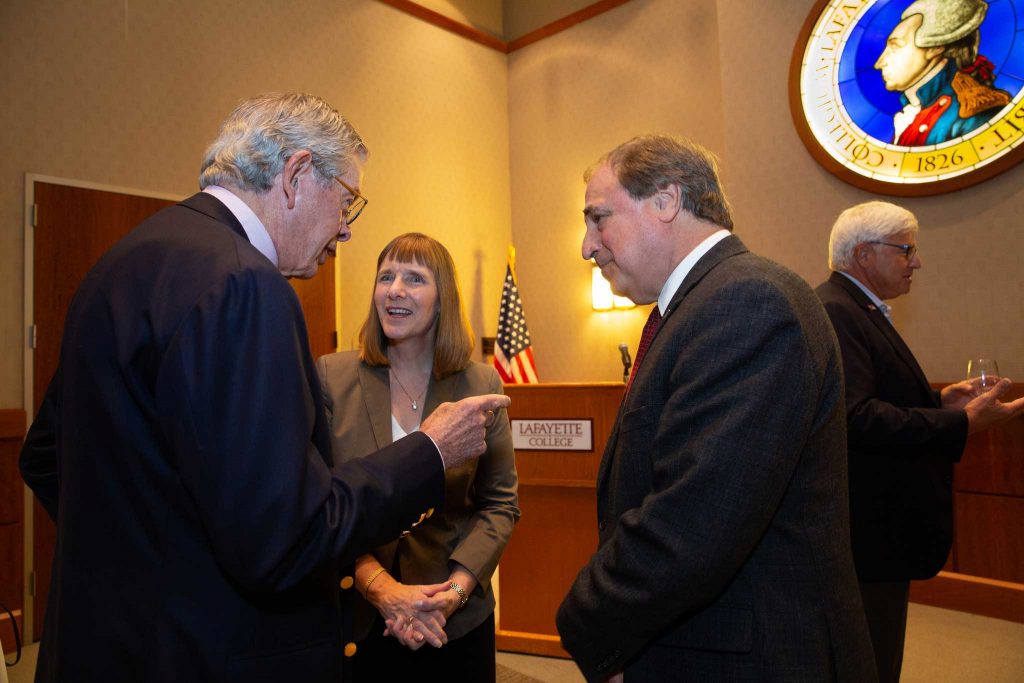 Bradbury Dyer III '64, Lafayette President Alison Byerly, and John Leone, senior associate director of major gifts, talk during the reception honoring Dyer.