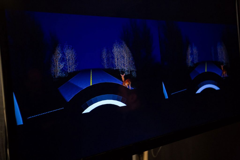 A animated deer appears on the screen of the autonomous car driving simulator.