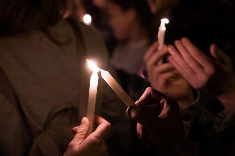 Lafayette students light candles at a vigil outside Colton Chapel at the annual Take Back the Night.