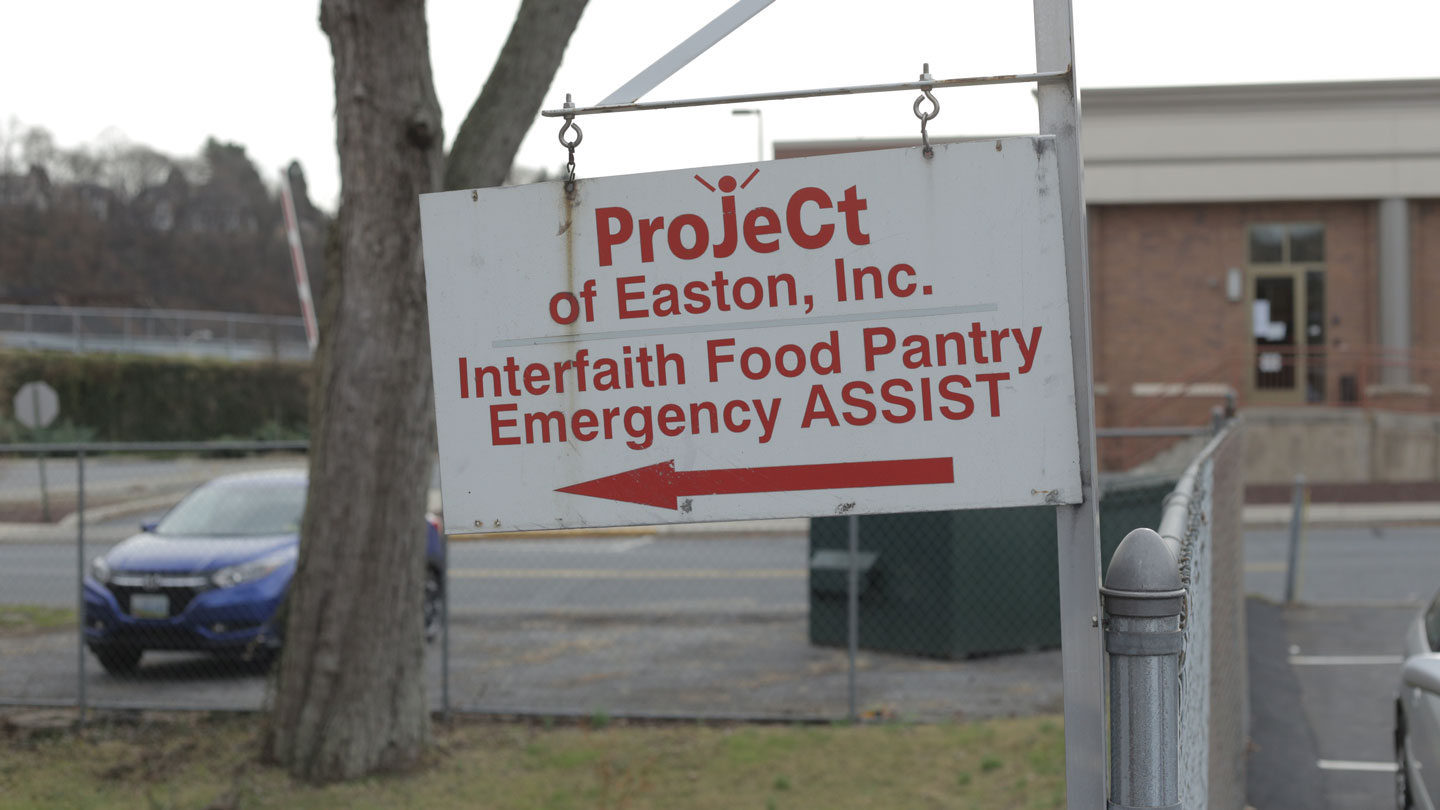 A sign for the ProJeCt of Easton Interfaith Food Pantry