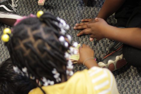 Lafayette students and school children play jenga.