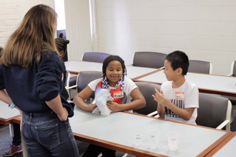 Students shake their bag.
