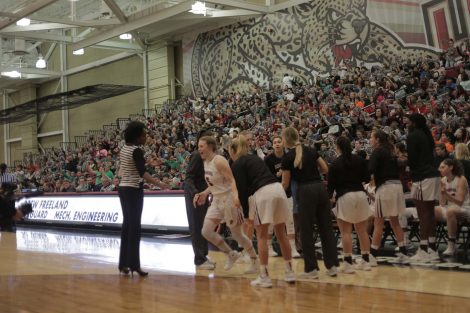 Starting line up has player running out.
