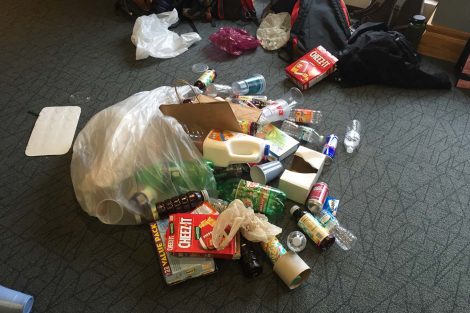 Recyclables spilling out of a bag.