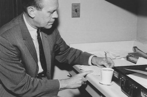 Gerald Ford takes notes before giving a talk at Colton Chapel in 1968 while serving as a U.S. Congressman.
