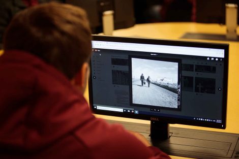 Student works on deciding what to remove from the image he works on.