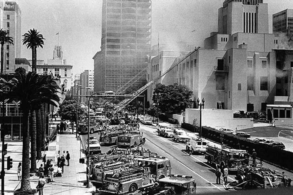 Firefighters spray water on the L.A. Library during the 1986 fire.