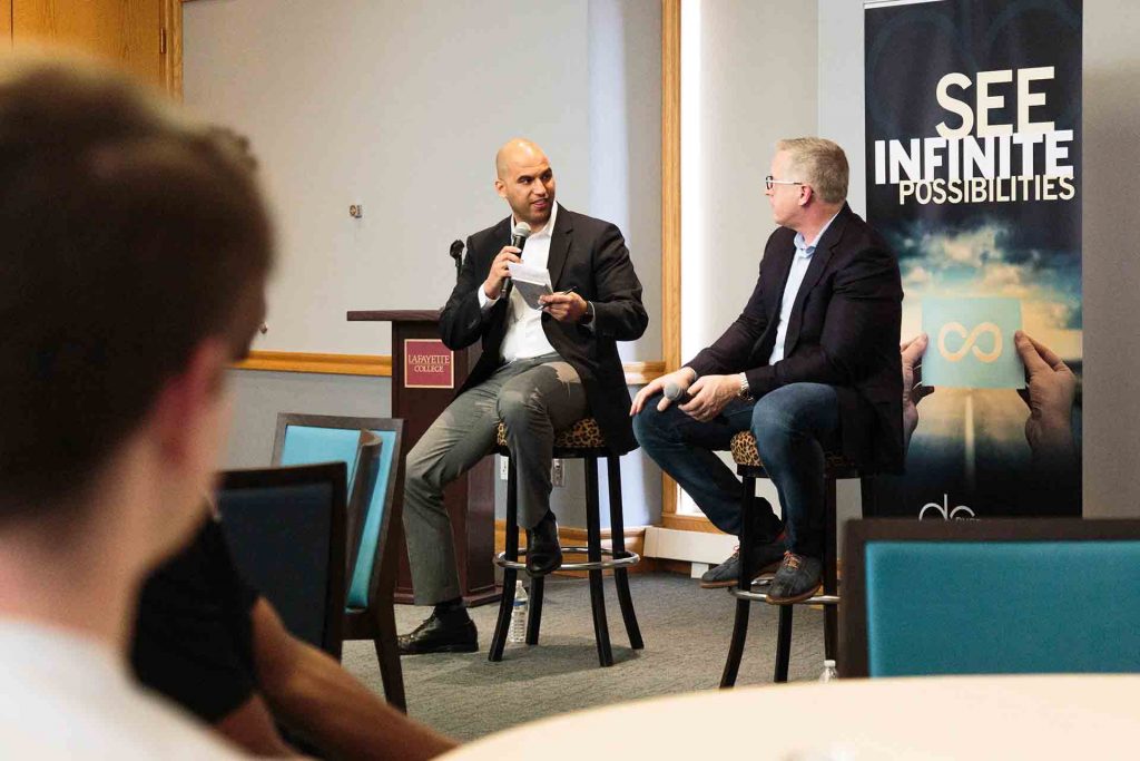 Yusuf Dahl asks Bill Wagner '89 a question during a Dyer Center guest lecture